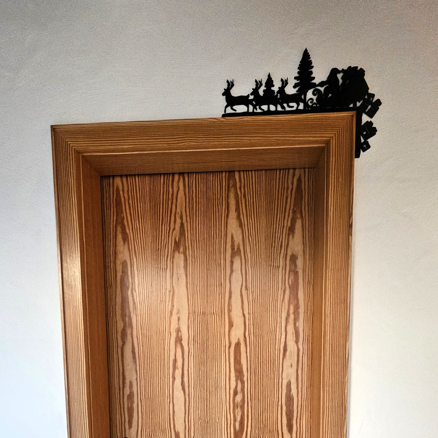 Décoration de porte « Père Noël et rennes »